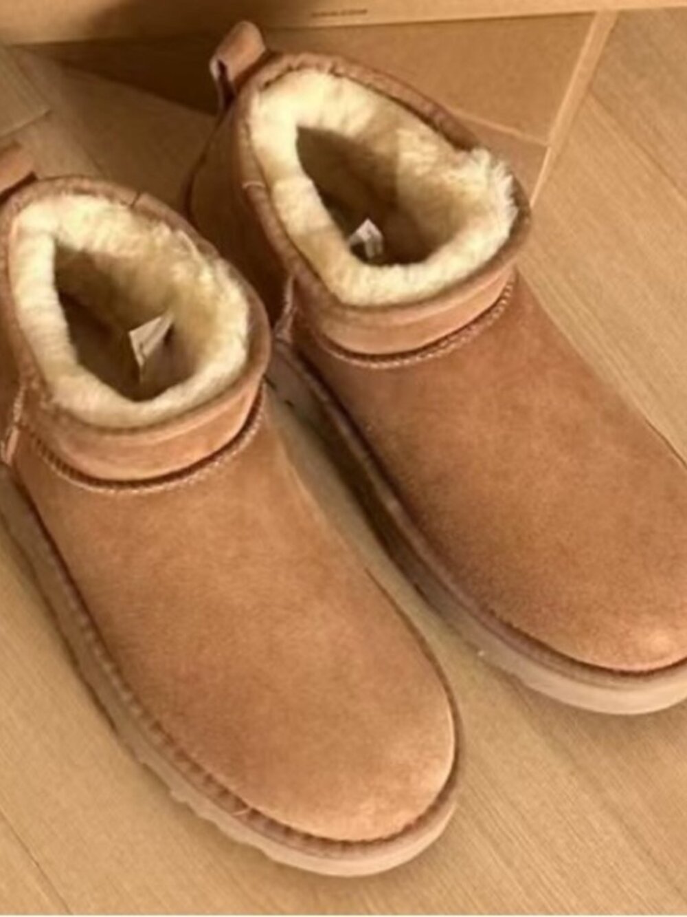 UGG Mini Booties in Chestnut Tan - Picture 2 of 7